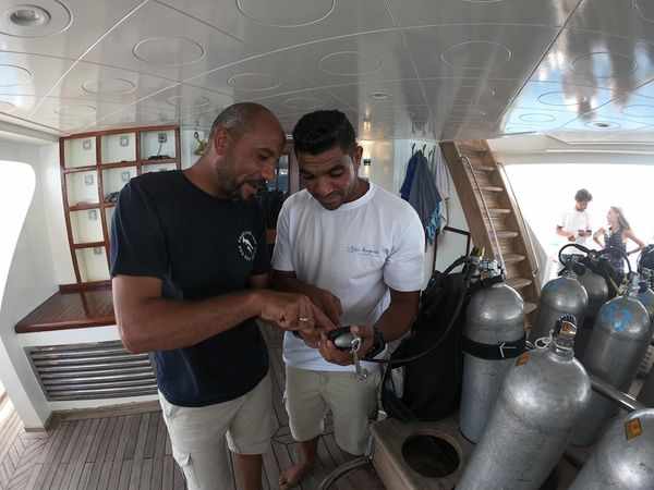 Dive hurghada team fixing a problem on board of the boat